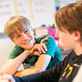 Greensboro Day School Photo #5 - Middle School students have a conversation during class.