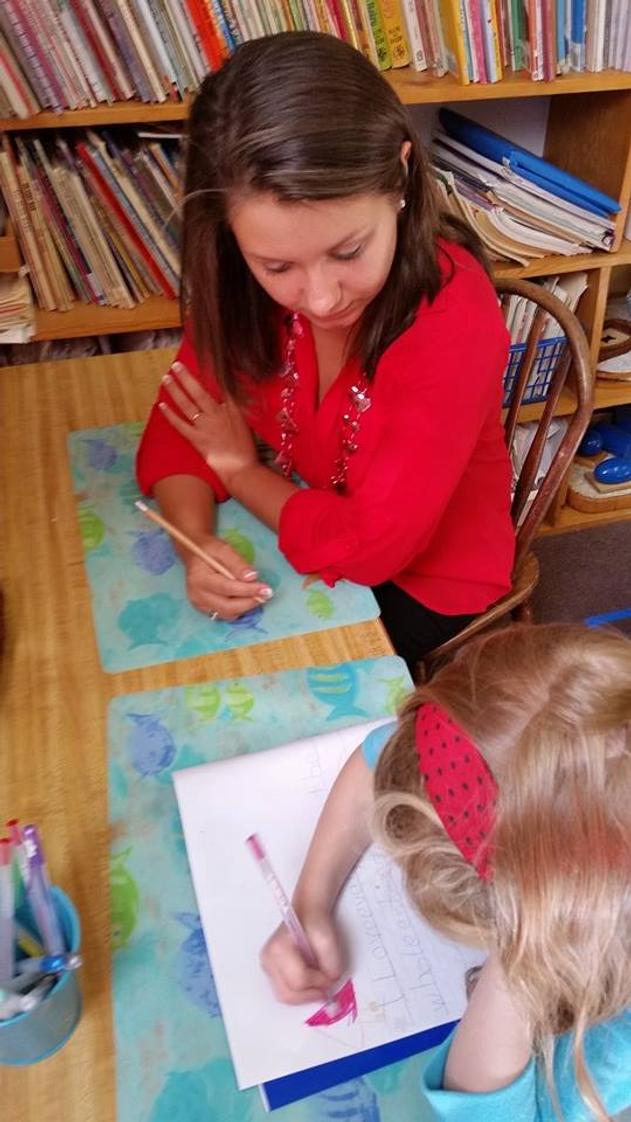 The Children's Schoolhouse Montessori Preschool Of Wilmington Photo - Preschoolers find great joy in learning to read and write at an early age!