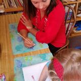 The Children's Schoolhouse Montessori Preschool Of Wilmington Photo - Preschoolers find great joy in learning to read and write at an early age!