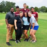 United Faith Christian Academy Photo #2 - 2018-19 Student Government Officers and Advisers serving with our local partner, Christian Adoption Services, at their annual golf outing.