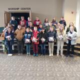 East Richland Christian Schools Photo #14 - Middle School students present Blessing Bags for the local homeless shelter.