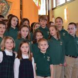 St. Helen Elementary School Photo #9 - Children singing together at mass.