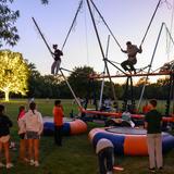 Western Reserve Academy Photo #3 - Weekend energy at our Back to School Bash! From bungee jumping to bonfires and s'mores, Pioneers balance hard work with big fun with a robust selection of weekend activities.