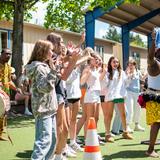 French International School of Oregon Photo #7 - Middle school students dancing with performers during Fte de la Musique.