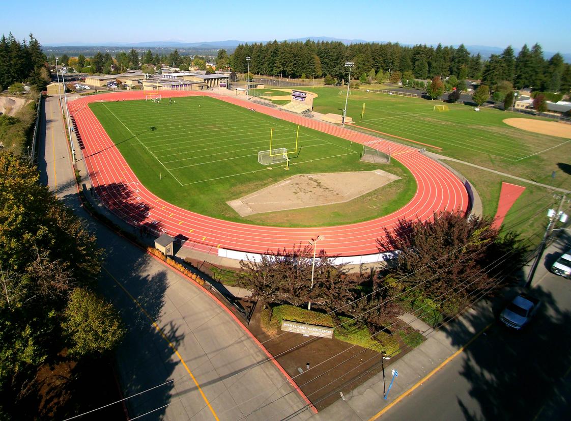 Portland Christian Jr./Sr. High School Photo - Looking over the track, soccer, football field, softball and baseball diamond towards the school in the background