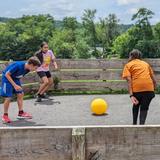 Center School Photo #8 - Recess is a time for students to enjoy each other's company and play some games. Students have access to a playground, basketball court, and a gaga pit, as well as access to the 14 acres of grounds.