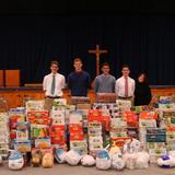 Devon Preparatory School Photo - Each year members of Devon Prep's Christian Action Program (CAP) collects and delivers thousands of food items to an inner city community center for Thanksgiving.
