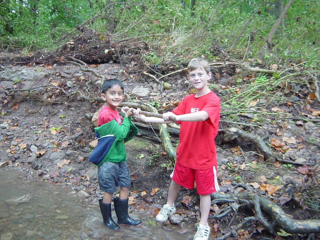 Germantown Academy Photo - Second grade students research various species in the Wissahickon Creek, which runs through the heart of GA's campus.