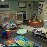 Kindercare Learning Center 868 Photo #3 - Infants need a safe, secure, "home away from home" where they can learn, play, and grow. Our younger infant room is designed as a smaller space to allow our younger and non-mobile infants to have that close and nurturing environment. Our teachers talk, sing, and read to our youngest infants to ensure the best start in educational life.