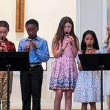 Charleston Christian School Photo #16 - Fourth graders proudly play recorders they've mastered in choir class, showcasing their musical growth. At CCS, we blend fun and education, offering programs that inspire creativity, build confidence, and nurture a lifelong love for the arts in every student.