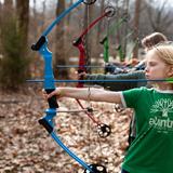 Abintra Montessori School Photo #2 - Student practicing at our Archery Range