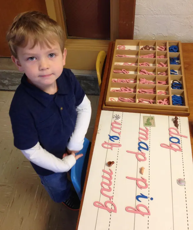 Little River Montessori School Photo #2 - Moveable alphabet work in the Early Childhood Classroom.