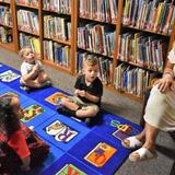 Heritage Christian Academy Rockwall Photo #6 - PreK in the Heritage Christian Academy library loving being read to.