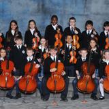 Immaculate Conception Catholic School Photo #5 - Immaculate Conception offers a Stringed Orchestra Program for grades 4-8. Instruction in violin, viola, and cello is offered.