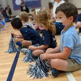 St. Francis Episcopal School Photo #4 - Primary School cheering on Upper School at the Homecoming Pep Rally.