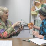 The Riverside School Photo #1 - Our Head of School and math teacher, Dr. Laurie Boswell, considers angle measurements with a 7th grader.