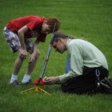 The Riverside School Photo #5 - Our science teacher helps a 6th grader launch the rocket he made at the end of a unit in class.