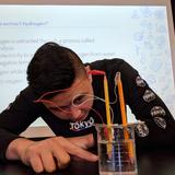 Rock Point School Photo #6 - A senior presents his physics research project to his class.