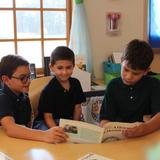 Loudoun Country Day School Photo #3 - At Loudoun Country Day School the Buddy Program is very popular. Older students read to the younger students and participate in various activities with them. Graduates of LCDS fondly remember this program long after attending our school.