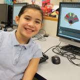 The Nysmith School Photo #5 - Nysmith students receive 30 minutes of computer instruction every day. Here, a fifth-grader works in Photoshop Elements as part of her computer instruction.