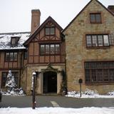 Sabot School Photo #2 - Our school is a former private residence that encompasses 28 acres, much of it wooded. The Preschool and Kindergarten classrooms are located in the main house, a 1920s tudor-style mansion, pictured here.