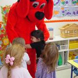 The Merit School Of Manassas Photo #3 - Clifford visited during the Scholastic Book Fair. Book Fairs are held twice a year--once in the fall and once in the spring.