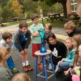 Peabody School Photo #4 - Students in 5th grade environmental science observe a physical reaction.