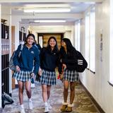 Annie Wright Schools Photo #22 - Upper School for Girls students walking near the girls lounge. We have co-ed lounge spaces, girls only spaces, and boys only spaces for students to relax, talk, and study