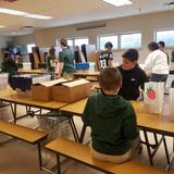St. Patrick Catholic School Photo #7 - We give back to our community by packing bagged lunches for the Secular Franciscans.