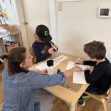 The Valley School Photo #8 - Students work in dynamic groups that shift and change often based on unit, practice and supported needed, and task.