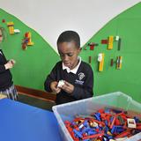 Visitation Catholic Stem Academy Photo - Learning about patterns on the Lego wall.