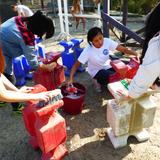 Pacific Academy Photo #4 - Helen Woodward Volunteering - PAE students cleaned up the facilities in preparation for the horse show that Helen Woodward puts on annually for their therapeutic riding program students.