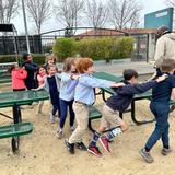 Escuela Bilingüe Internacional Photo #3 - Grade 2 students weaving with the PE teacher.