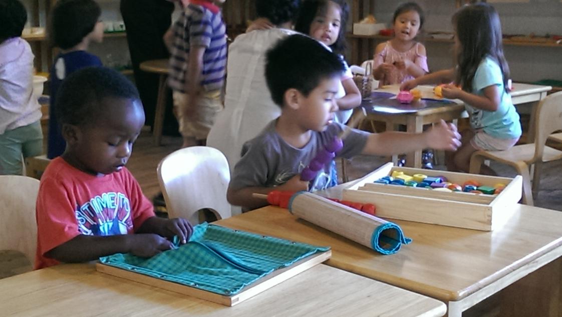 The Childrens Place Montessori Photo - Developing concentration, coordination and confidence with our Montessori Practical Life activities.
