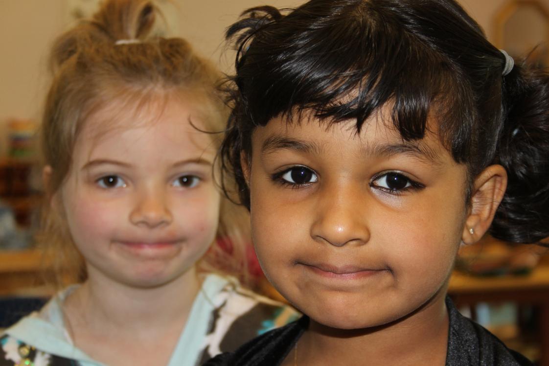 The Happy Childrens Montessori Photo - Two happy students.