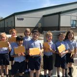 St. John Neumann Academy Photo #3 - Mailing their Flat Stanley Projects!