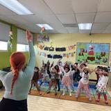Kids Adventure Learning Center Photo #8 - Dance class with Ms. Tanya, we LOVE getting up and moving! Kids Adventure had two yearly recital to showcase our little super stars not only in their classrooms but with Dance performances as well, just another one of our Free Enrichment Programs.