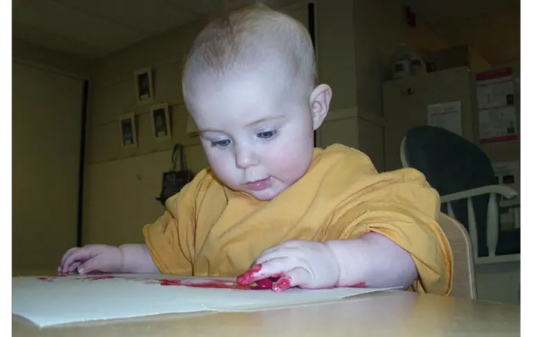 Darien KinderCare Photo #2 - Finger painting in the infant room