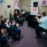 Whitefield Academy Photo #7 - Our music teacher, Mrs. Martin, teaches our smallest students about rhythm. Even our Pre-K students will have numerous hymns memorized in their entirety by the end of the year, performing a concert for Christmas and for Grandparents' Day.