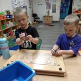 Atonement Lutheran Photo #3 - Our preschool 3's working on figuring out puzzles and mazes