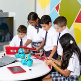 All Saints Catholic School Photo #3 - Media:scape Learning Classrooms to further technology integration. Students are programming Dash & Dot robotics with their iPads.