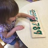 Children's House Montessori School Photo #8 - Each child practices how to be safe and show grace and courtesy, while developing his/her art, music, fine and gross motor skills.