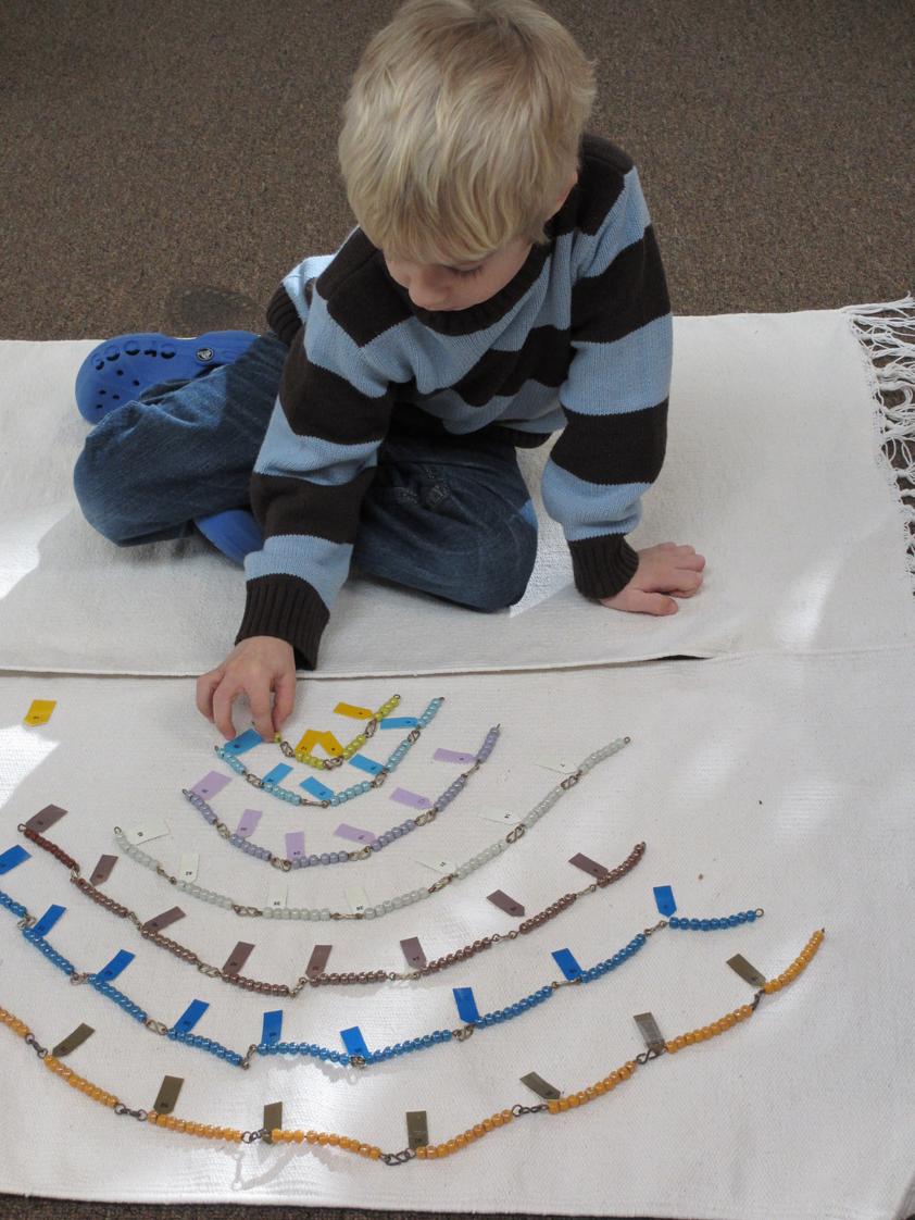 Follow The Child Montessori School Photo - Math work in the 3-6 classroom (skip counting, ex: 2-4-6-8...)