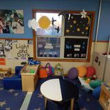 Kindercare Learning Center Photo #7 - Learning about Light and Dark in the Dramatic Play Area