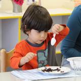 Leport Montessori Irvine Westpark Photo #7 - Toddler learning life skills - serving snack