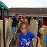 Alexandria KinderCare Photo #6 - Children love to run and play on our playground and build gross motor skills!
