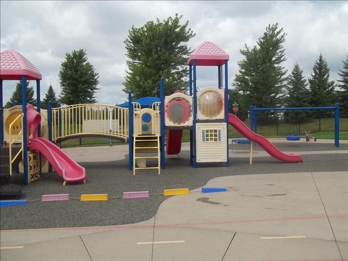 Prior Lake Savage KinderCare Photo - Larger playground. For children 24months and older. We also have bikes, basketball hoop, tire swing and play house.