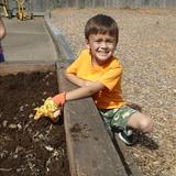 Clear Lake KinderCare Photo #6 - Planting tomato seeds