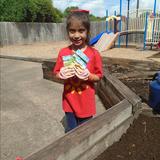 Clear Lake KinderCare Photo #4 - We are planting squash, zucchini, and tomato seeds in our garden.
