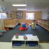 Forest Lane KinderCare Photo #3 - Our infants enjoy a clean open space where they can move freely and develop their whole body.